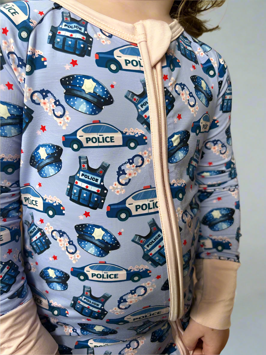 Loved by A Law Enforcement Officer convertible footie (purple)
